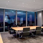 tilt top modular boardroom tables. A high quality modular system aimed at multi purpose boardrooms and meeting rooms. High quality tilt top tables combine the best attributes of impressive meeting tables with a modular configuration and easy movement to support adaptable spaces. The modular tilt-top systems from Fusion Executive Furniture has a very wide range of finishes. Power sockets and Av can be integrated into the tables.